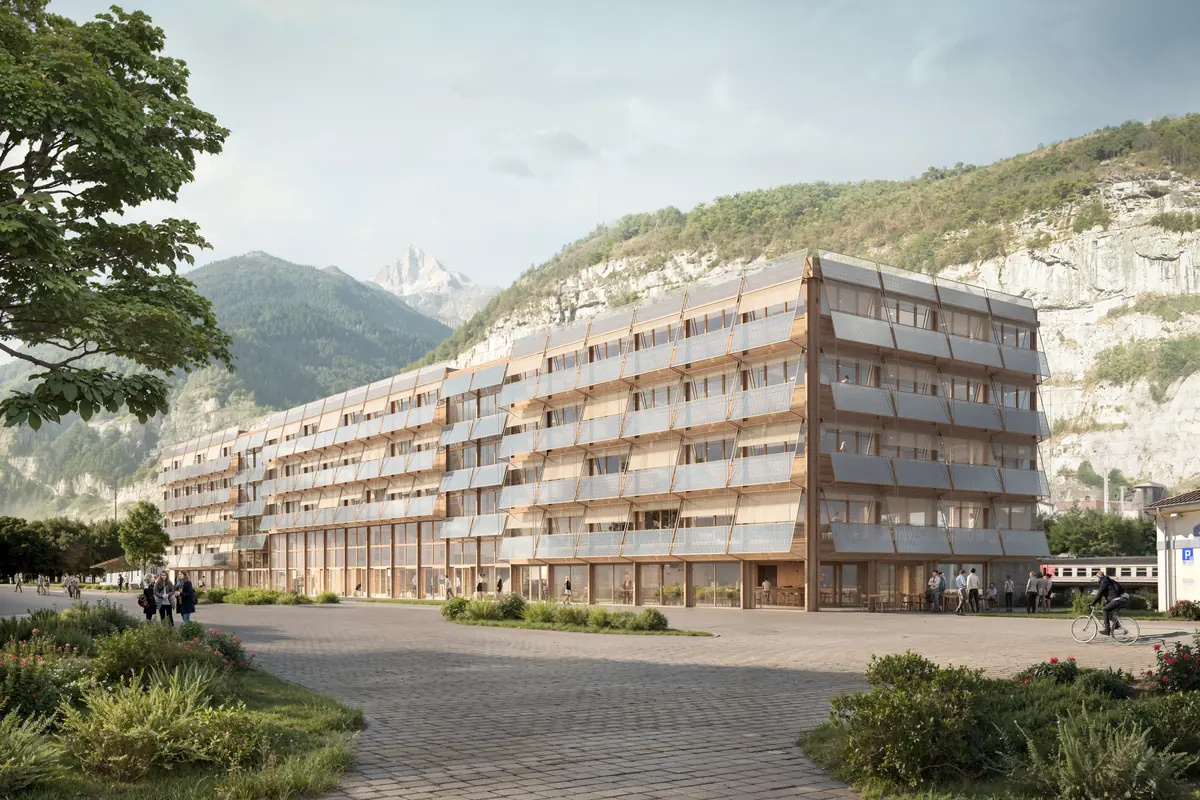 Infografía 3D de un edificio de madera con fachada de paneles fotovoltaicos en un valle alpino