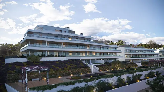 Infografía 3D de edificios escalonados y jardines desde el acceso de Vanian Park, promoción residencial en Estepona, Málaga (HCP Arquitectos)